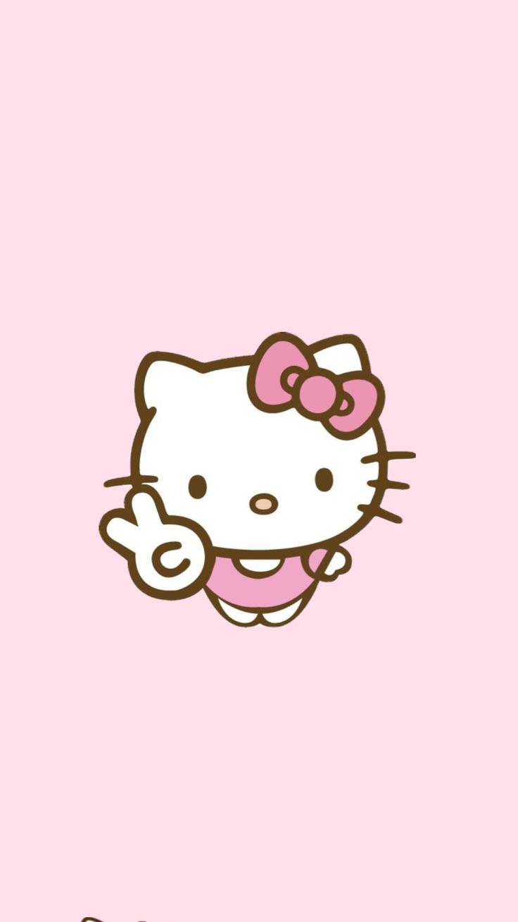 the hello kitty wallpaper is pink and has an image of a smiling cat on it