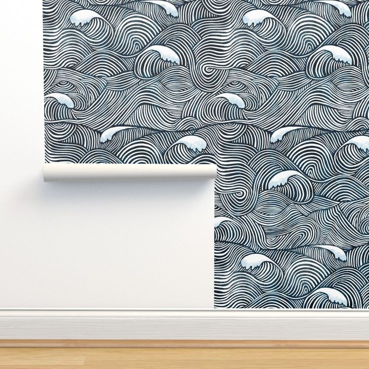 the wallpaper is designed to look like waves and polar bears in blue, white or black