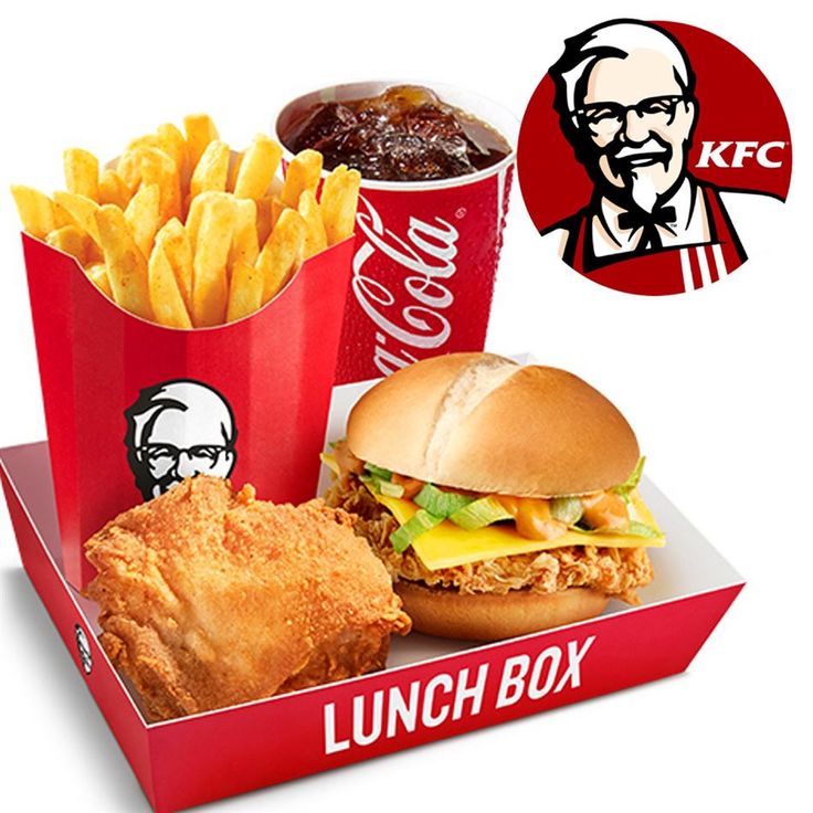 a lunch box with chicken, french fries and soda