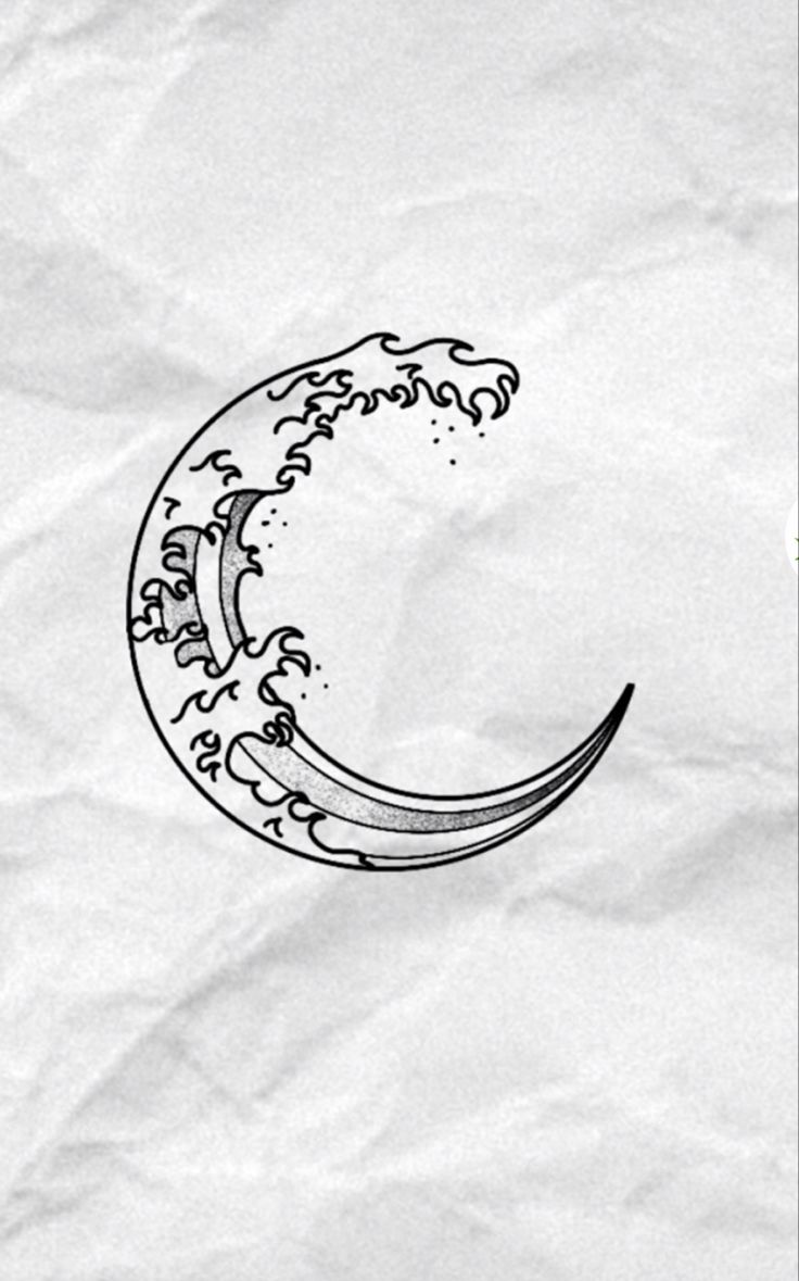 a drawing of a wave in the shape of a crescent on top of a piece of paper