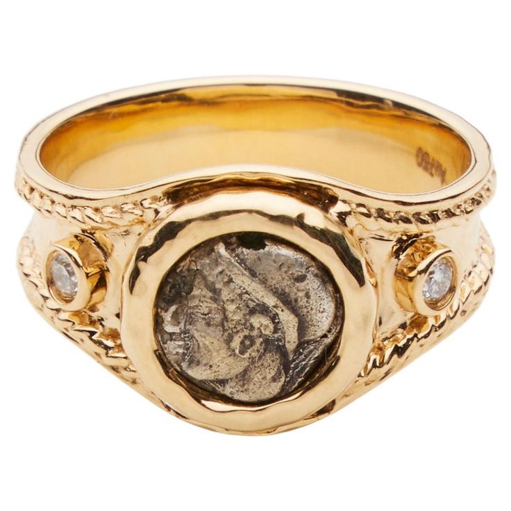 18-karat yellow gold Ancient, authentic silver coin of head of Lady. Decorate with two white diamonds Size 6 Luxury Coin-shaped Intaglio Jewelry, Gold Coin-shaped Engraved Signet Ring, Gold Diamond Jewelry With Intaglio, Gold Engraved Coin Signet Ring, Yellow Gold Coin-shaped Hallmarked Rings, 14k Stamped Yellow Gold Coin Ring, Silver Coin Ring, Coin Ring, Jewelry Studio