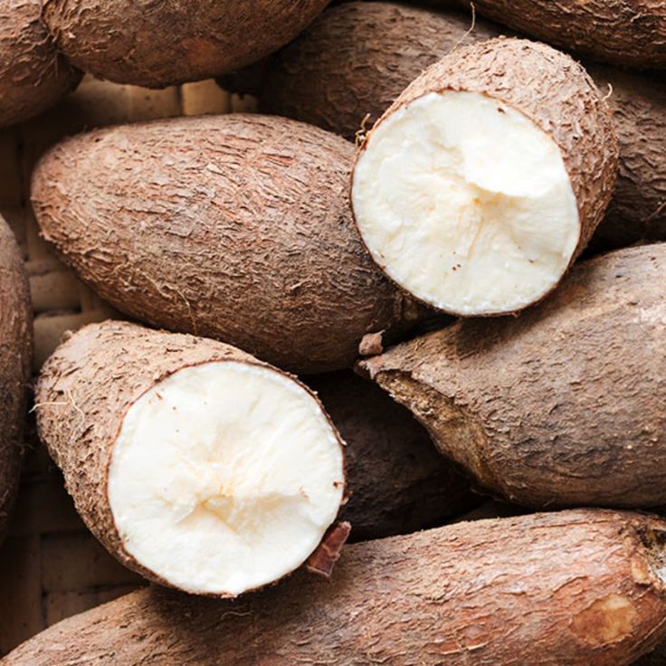 a pile of cut up coconuts sitting on top of each other