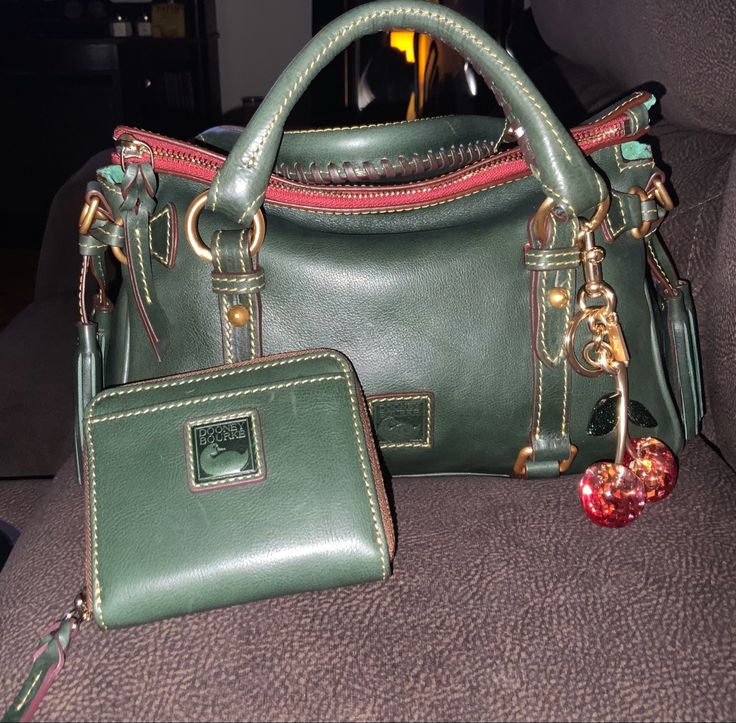 Dooney and Bourke Florentine mini satchel in ivy with matching florentine deluxe mo small zip around wallet Nfl Chiefs, Monogram Pendant, Satchel Tote, Leather Products, Dooney And Bourke, Dooney & Bourke Bags, Dooney & Bourke, Friday Sale, Classic Collection