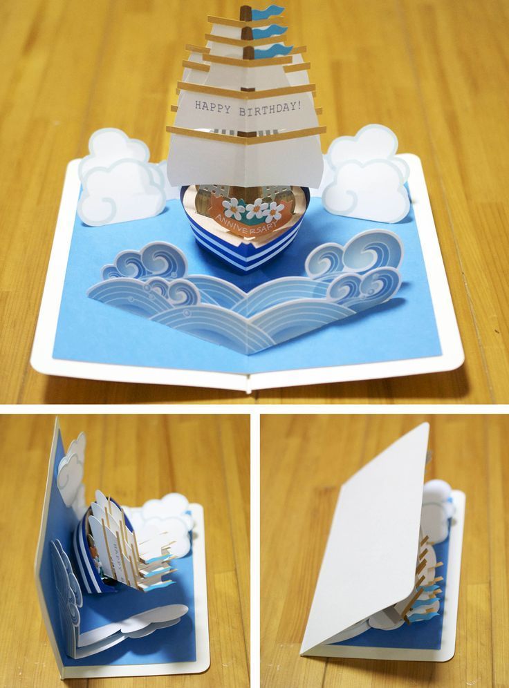 an open book with a boat on it and the pages cut out to look like they are