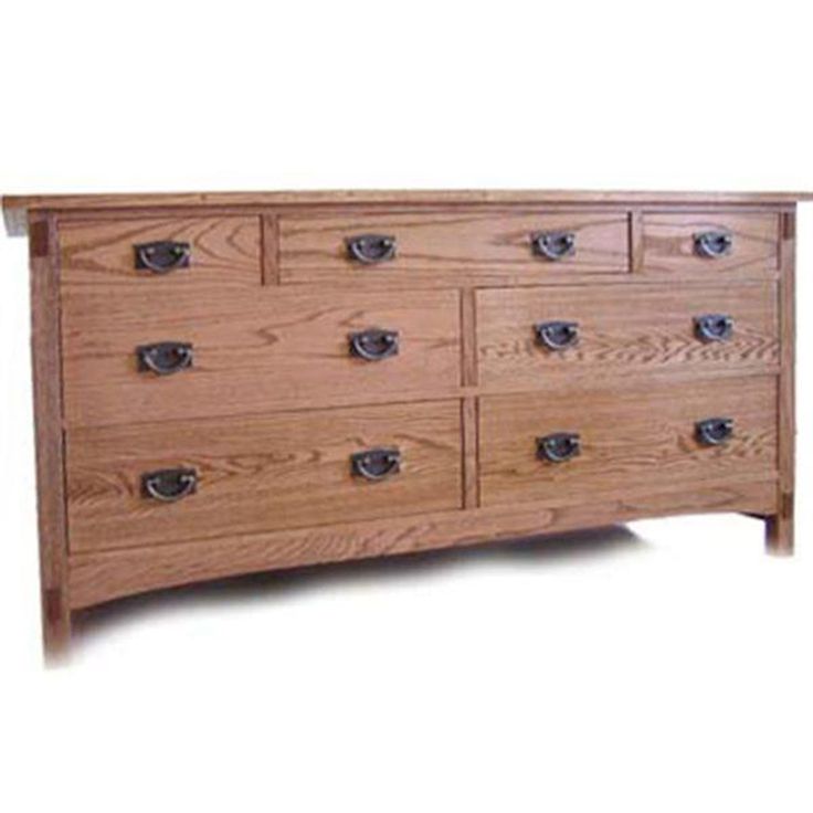 a wooden dresser with many drawers and knobs