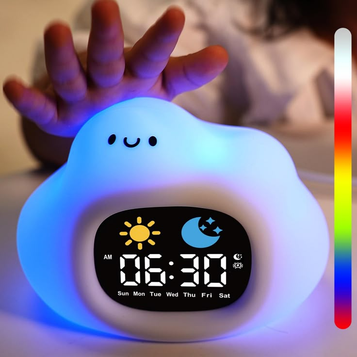 the alarm clock is glowing in the dark