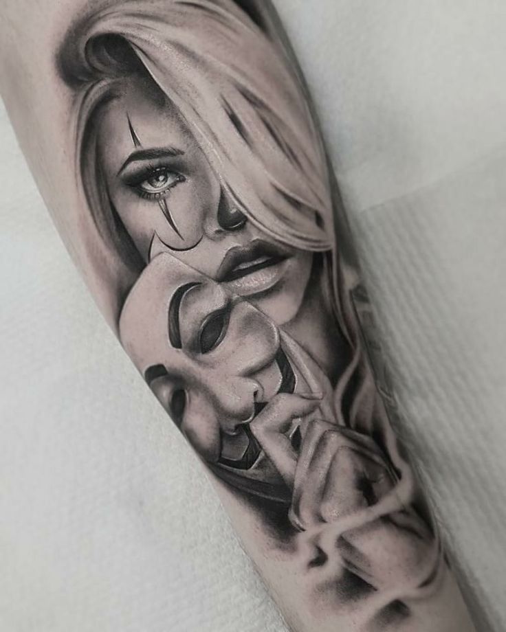 a woman with a mask on her face is shown in this black and white tattoo