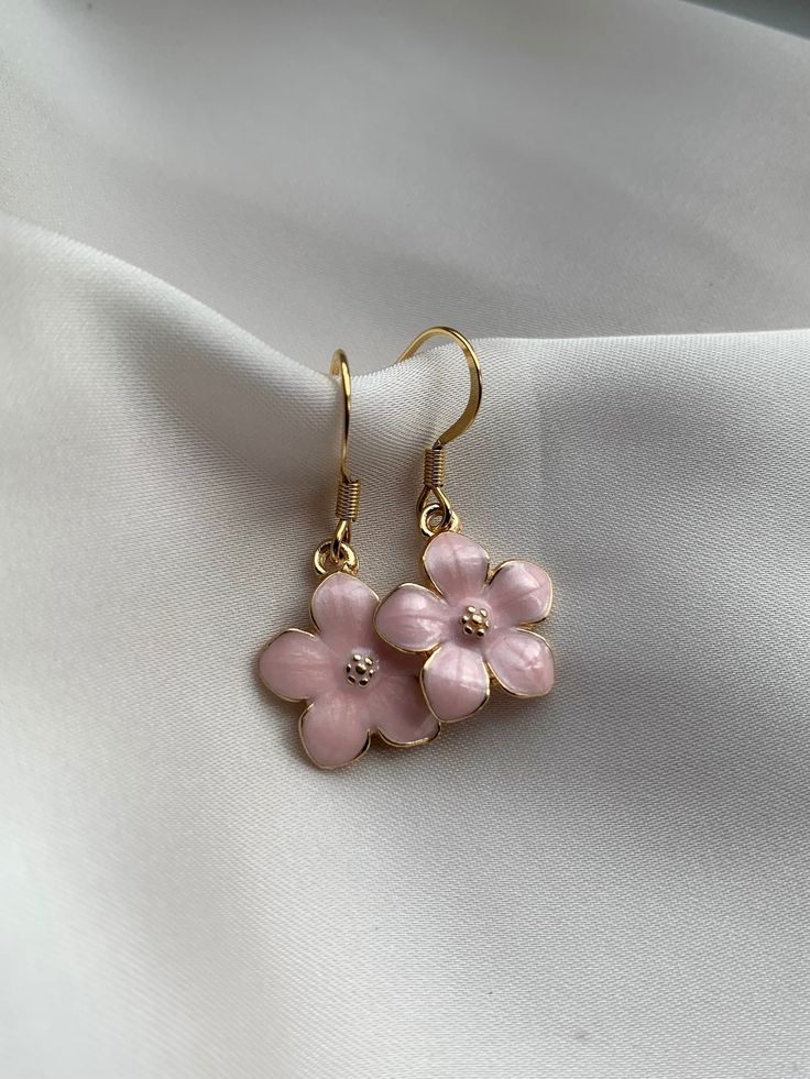 These stunning pink flower earrings are perfect for a friend, yourself or gift for Mother's Day! - Handmade by me  - Hypoallergenic gold plated 304 stainless steel hooks - All earrings come with a rubber back. - Your purchase will come in a card holder, bag, and a bag of sweets 🍬  - For hygiene reasons NO RETURNS OR     REFUNDS. - FREE SHIPPING Care info:  Please take care of your handmade earrings. Do not sleep in them, come into contact with water with them or perfume etc as this will damage Cheap Spring Flower Charm Earrings, Spring Flower Shaped Jewelry With 3d Flowers, Spring Rose Gold Flower Jewelry, Feminine Blossom Jewelry For Spring, Rose Gold Flower Jewelry For Summer, Rose Gold Flower Shaped Jewelry For Spring, Rose Gold Flower-shaped Jewelry For Spring, Summer Rose Gold Flower Jewelry, Summer Jewelry With 3d Flower Shapes