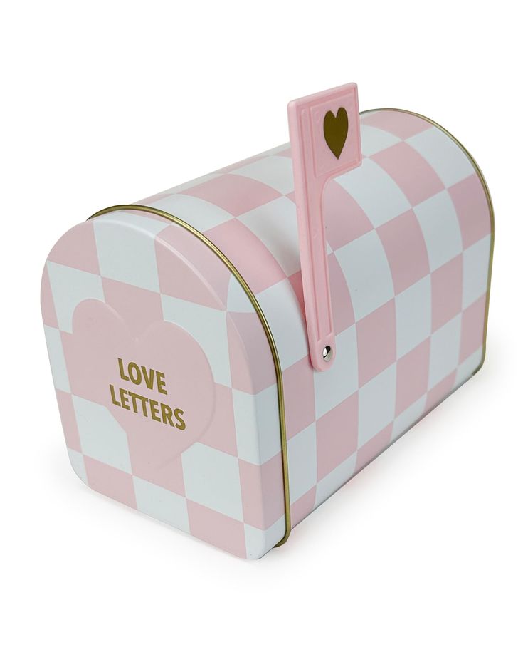 a pink and white checkerboard mailbox with a heart on the top that says love letters