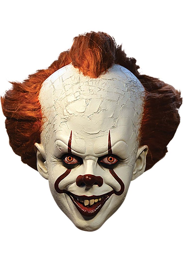 a creepy clown mask with red hair