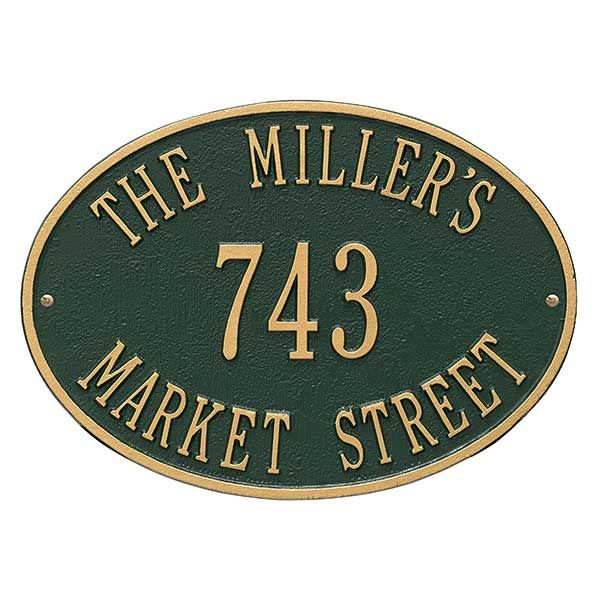 the miller's market street sign is black and gold with white lettering on it