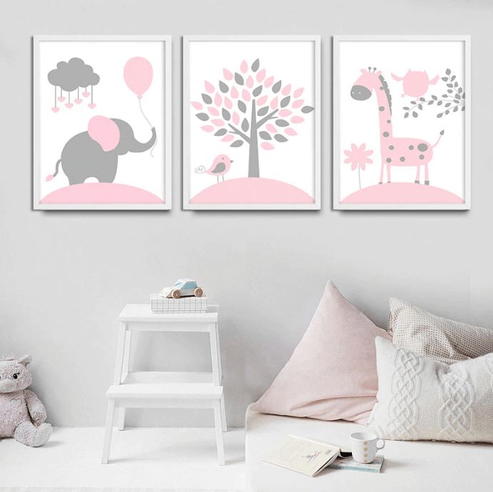 three children's wall art prints in pink and grey, including an elephant, giraffe, tree with balloons