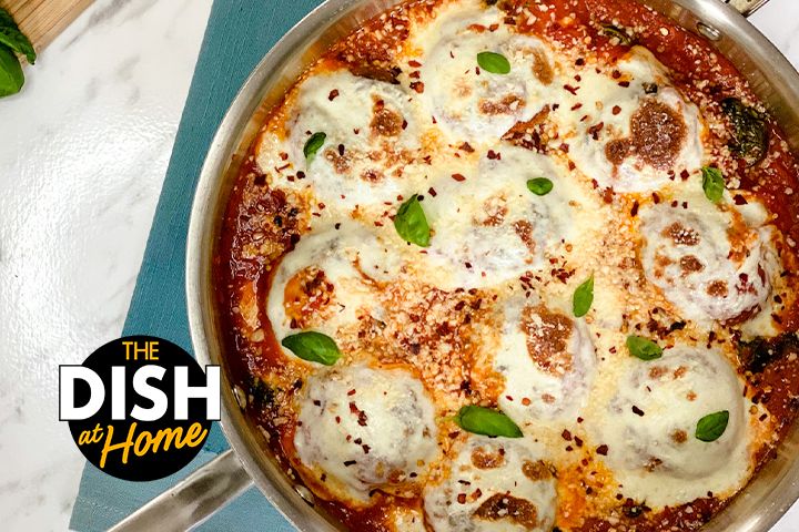 the dish is ready to be eaten on the stove top, with basil and mozzarella toppings