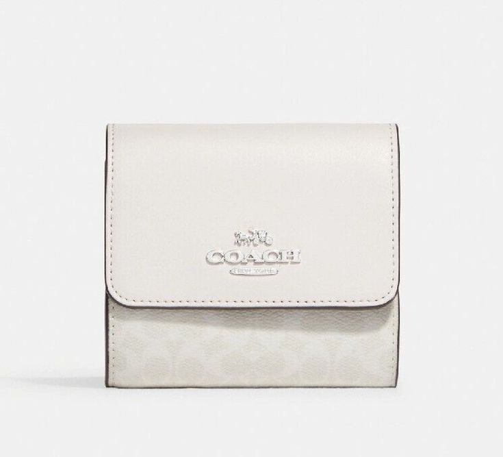 PLEASE SEE ALL PHOTOS AND READ DESCRIPTION AND DETAILS BEFORE PURCHASING * 💝NWT COACH TRIFOLD WALLET IN COLORBLOCK SIGNATURE CANVAS GLACIER WHITE/SILVER. * BRAND NEW WITH TAGS * - SEALED IN ORIGINAL PACKAGING - LEATHER/COATED SIGNATURE CANVAS - SNAP CLOSURE - OUTSIDE POCKET - CREDIT CARD SLOTS - SEE LAST PIC FOR MORE DETAILS AND MEASUREMENTS - STORED IN SMOKE/ PET FREE ENVIRONMENT - NO ADDITIONAL DISCOUNTS/ RETURNS - NO INTERNATIONAL, ALASKA OR HAWAII SHIPPING * ALL ITEMS SOLD ARE 100% AUTHENTI