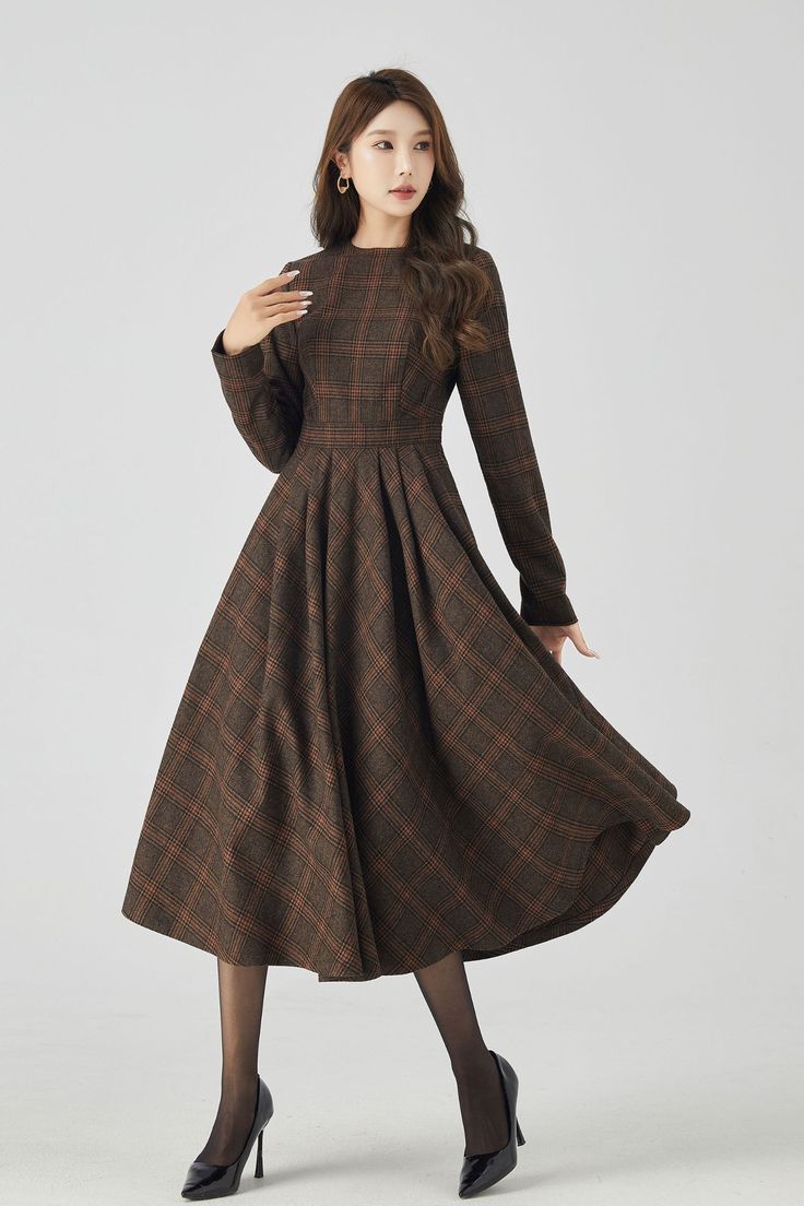 Rock the chic look with this Long Sleeve Plaid Midi Wool Dress. Stay cozy and stylish all day. 

SKU 4523 
Link in bio 

#Fashion #WinterStyle #PlaidDress #MidiDress #WoolDress #Xiaolizihandmade Fitted A-line Plaid Dress For Fall, Winter Midi-length Tweed Dress, Winter Midi Length Tweed Dress, Long Sleeve Brown Plaid Dress For Fall, Fitted Plaid Winter Dress, Fall Midi-length Tweed Dress, Formal Wool Tweed Dress For Fall, Wool Tweed Dress For Formal Fall Occasions, Classic Fitted Tweed Dress For Fall