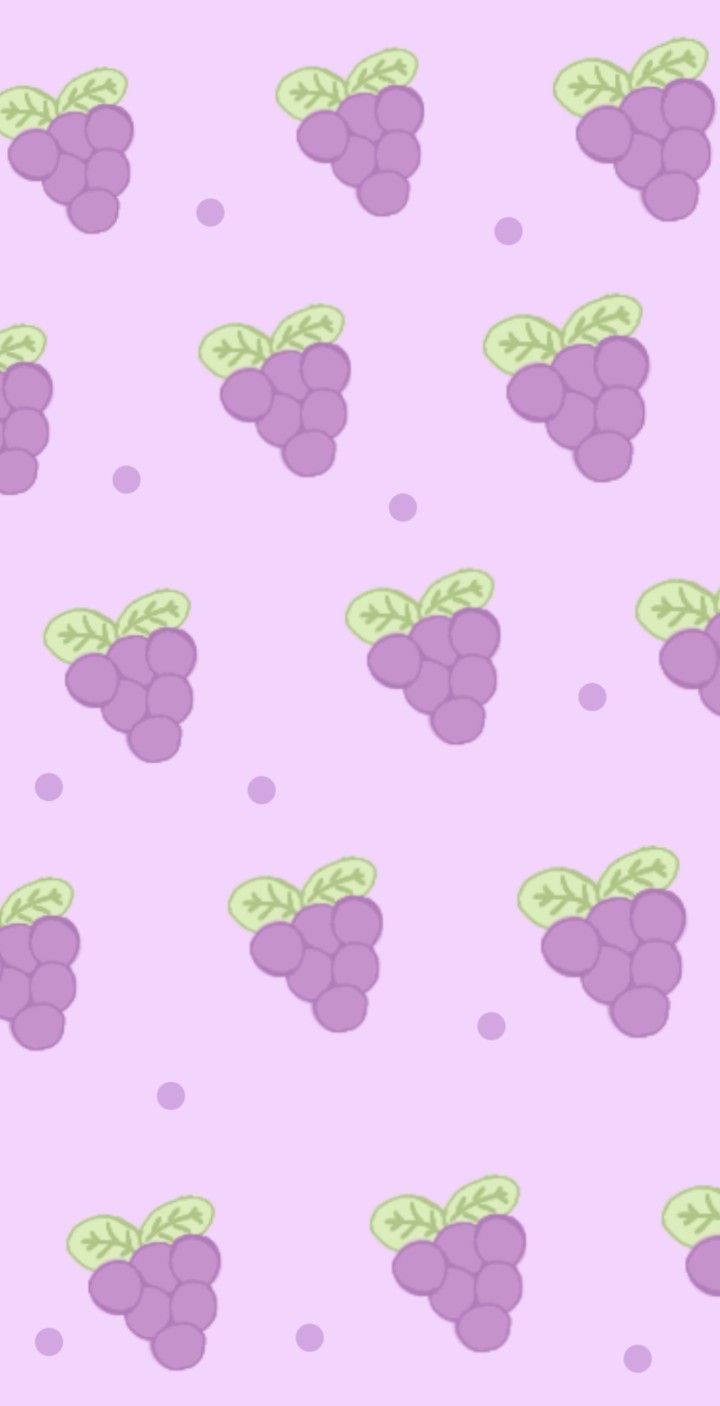 grapes on a purple background with polka dots