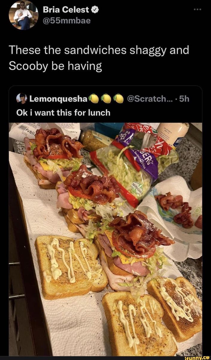 some sandwiches are sitting on top of a table