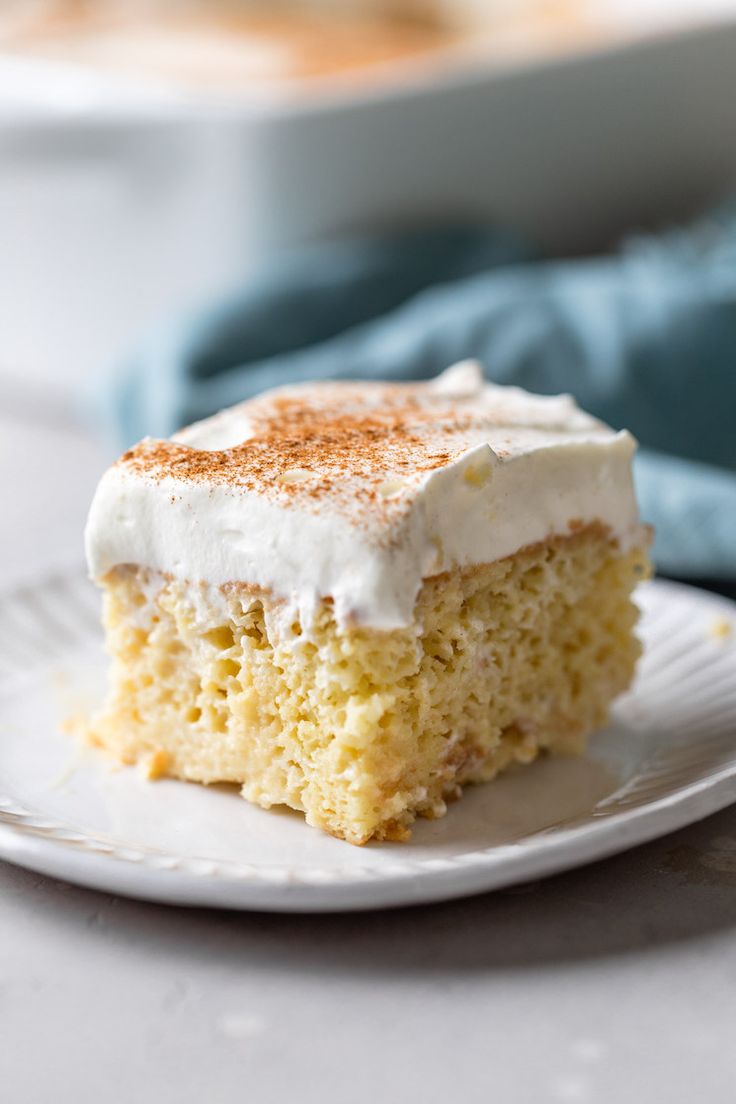 a piece of cake sitting on top of a white plate