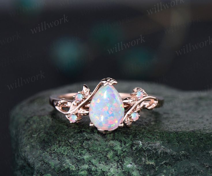 - Metal: Solid gold(10K/14K/18K white/yellow/rose gold),925 sterling silver,platinum available- Main Stone: 6x8mm pear lab opal- Accent Stone: natural amethysts- Band Width: 1.4mm- Can be personalized: Yes Pear Shape Opal Engagement Ring, Engagement Ring With Opal, Chicken Wedding, Celestial Engagement Ring, Opal Wedding Ring Set, White Opal Engagement Ring, Engagement Ring Opal, Opal Engagement Ring Rose Gold, Opal Engagement Rings