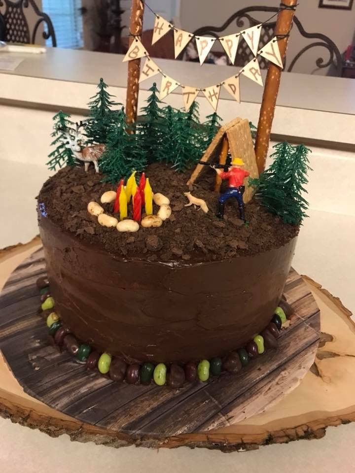 a large chocolate cake with decorations on top