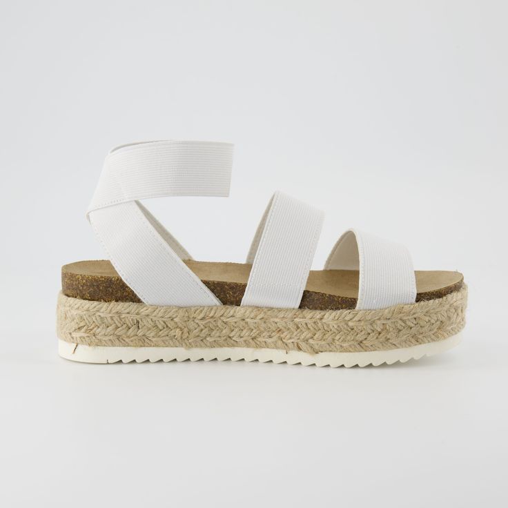 Meet Mandy, a platform espadrille sandal. Slip into these sandals easily with a soft, stretch gore upper and a cushioned insole for all-day wear. Mandy's espadrille-style midsole and traction outsole provide support and stability while the 2-inch platform adds a touch of height.