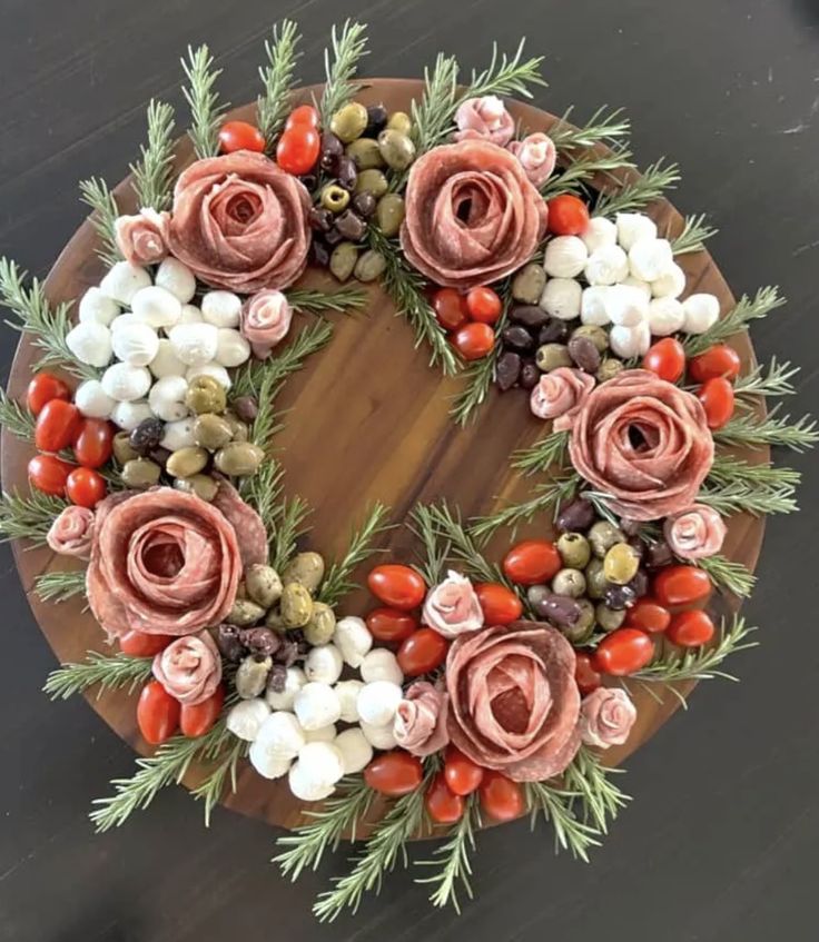 a wreath made out of flowers and berries