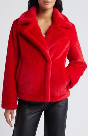 Introduce ultimate glamour to your cold-weather wardrobe with this sumptuous faux-fur jacket featuring dramatic notched lapels. 24" length (size Medium) Notched lapels Front welt pockets Lined 100% polyester faux fur Dry clean Imported Red Fur Coat With Faux Fur Trim, Red Fur Coat With Faux Fur Trim For Fall, Red Faux Fur Coat For Fall, Red Faux Fur Outerwear For Fall, Chic Red Fur Coat For Fall, Red Faux Fur Long Sleeve Outerwear, Red Fur Coat For Fall, Chic Red Faux Fur Outerwear, Red Faux Fur Coat