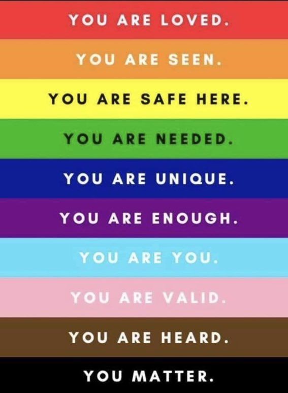 a rainbow colored poster with the words you are loved