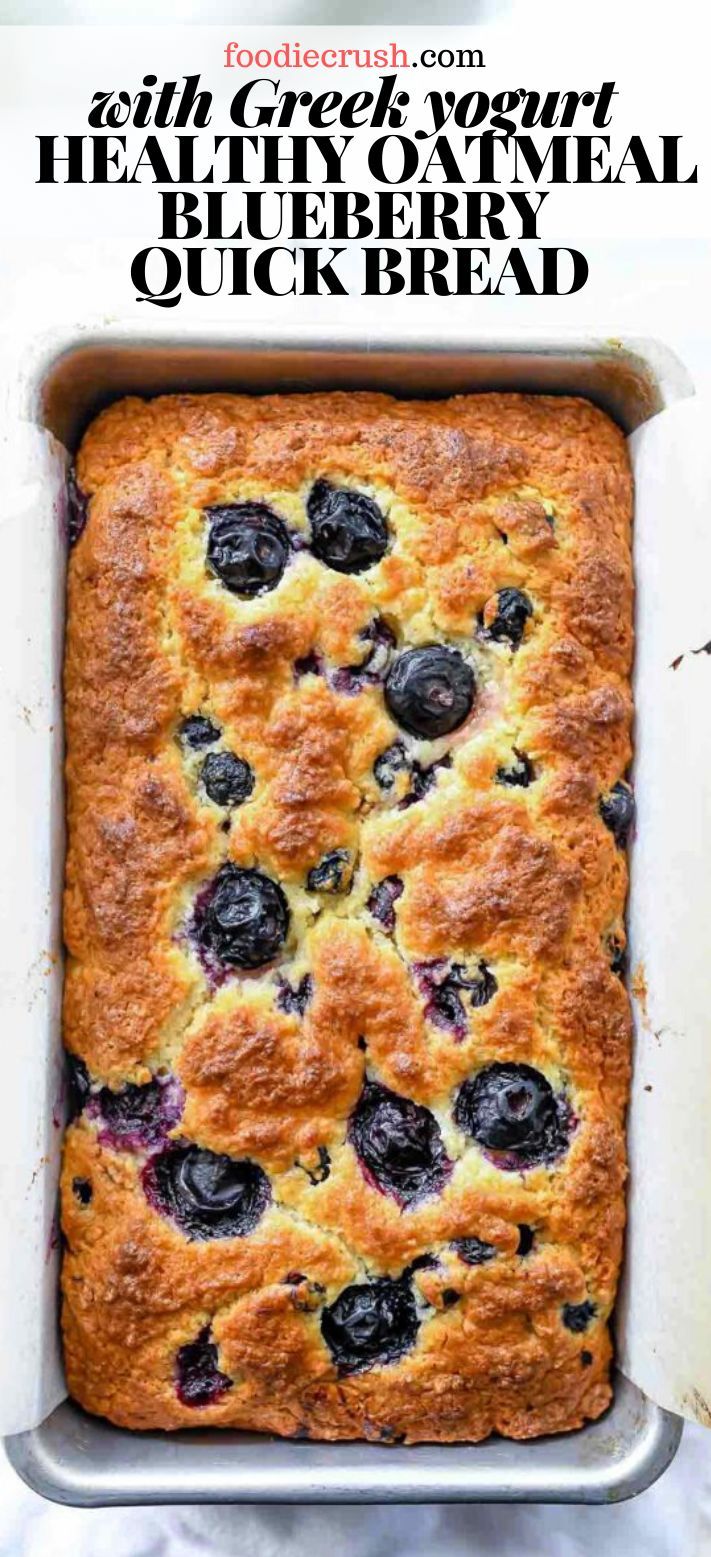 blueberry quick bread in a baking pan with the title text overlay reads healthy oatmeal blueberry quick bread