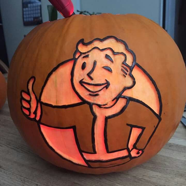 a carved pumpkin with an image of a man on it