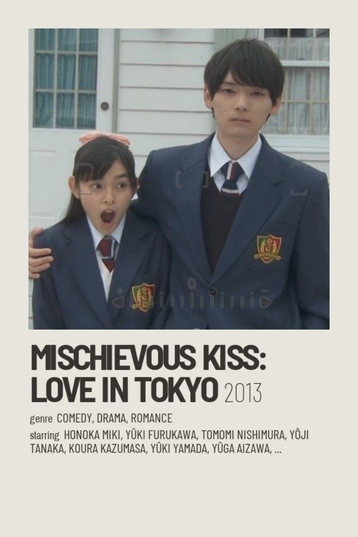 two young people standing next to each other in front of a poster that says mashievous kiss love in tokyo 2013