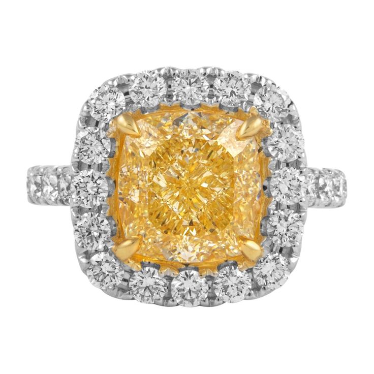 a yellow and white diamond ring