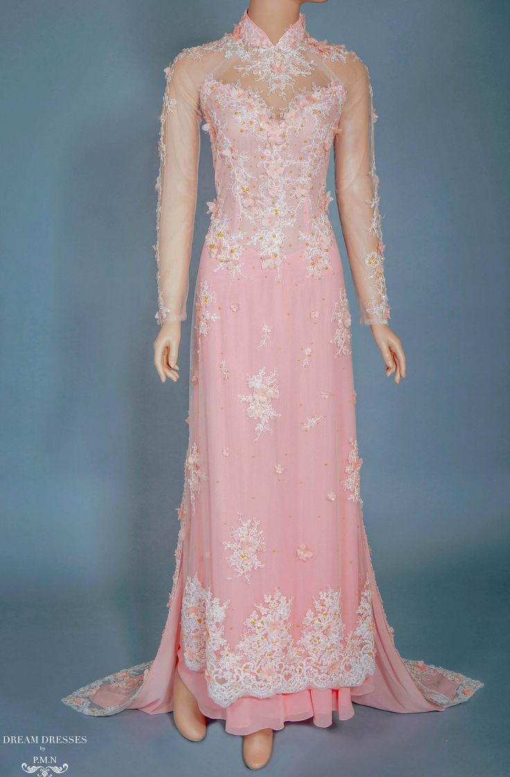 Custom made blush pink chiffon Ao Dai with beaded lace Materials: chiffon, tulle Neckline: traditional collar Long sleeves Closure: Zipper Chiffon pants Chapel train Pink Floor-length Wedding Dress With Sweep Train, Pink Floral Embroidery Evening Dress For Formal Occasions, Pink Gown With Fitted Bodice For Wedding, Pink Floor-length Dress For Wedding, Pink Floral Embellished Evening Dress For Wedding, Pink Wedding Gown With Fitted Bodice, Pink Lace Bodice Evening Dress For Wedding, Floral Embroidered Evening Dress For Wedding, Elegant Pink Gown With Floral Embroidery