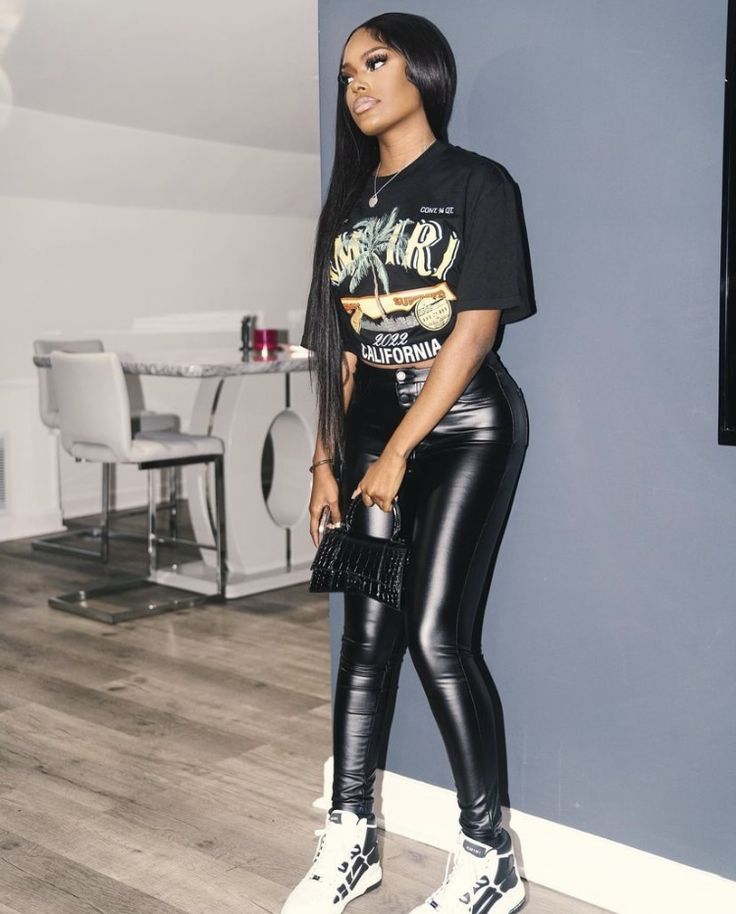 Leather Pants Outfit Black Women With Sneakers, Black Amiri Shoes Outfit, Baddie Leather Pants Outfit, Amiri Jeans Outfit Black Women, Leather Pants And Graphic Tee Outfit, Amiri Shirt Outfit Black Women, Leather Pants Outfits Black Women, Leather Jeans Outfit Black Women, Leather Pants Outfit Baddie