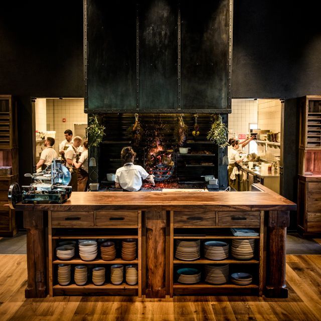 the kitchen is clean and ready to be used for many cooks, including two chefs