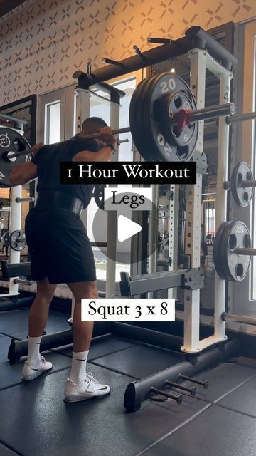 a woman is doing squats with a barbell in front of her and the text, i hour workout legs squat 3x8