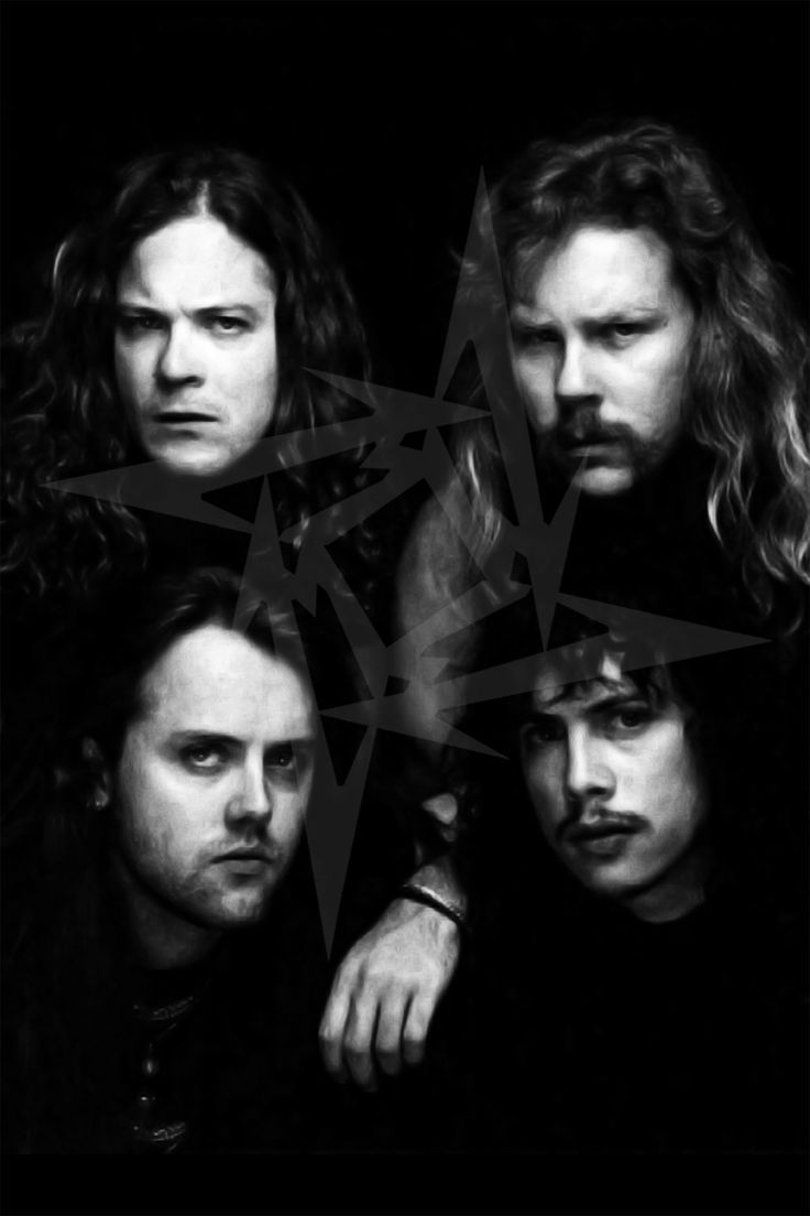 four men with long hair and beards are posing for a black and white photo