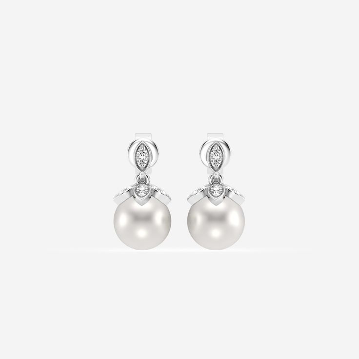 Add a subtle touch of sophistication to your outfit with these pearl and diamond mini drop earrings. Gleaming pearls hang from lab grown marquise diamonds, creating a striking combaintion of sparkle and luster. Chic and versatile, these pearl and diamond mini earrings can easily be worn from day to night for almost any occasion. Luxury Prong Set Pearl Earrings, Mini Earrings, Custom Gown, Diamond Flower, Marquise Diamond, Fashion Earrings, Lab Grown Diamonds, Wedding Accessories, Fresh Water