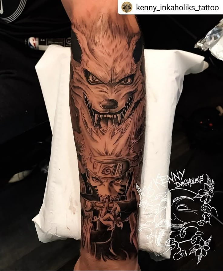 a man with a wolf tattoo on his arm