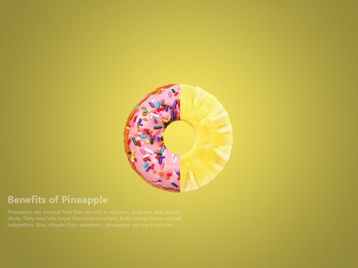 a pink donut with sprinkles and a pineapple on the side