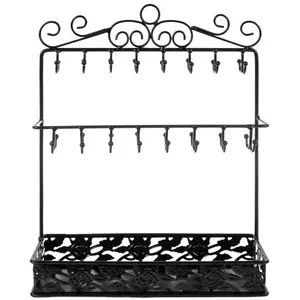 an iron rack with hooks and keys on it, isolated against a white background photo