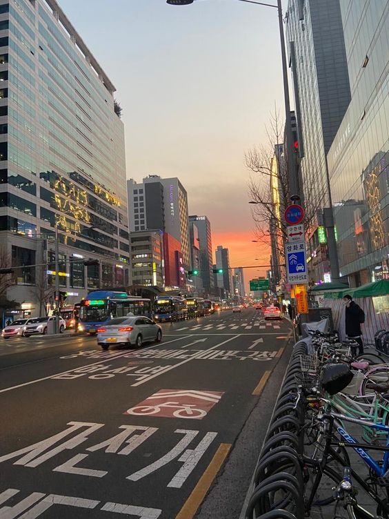 a city street filled with lots of tall buildings