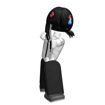 a black and white figurine with red eyes holding a knife in it's mouth