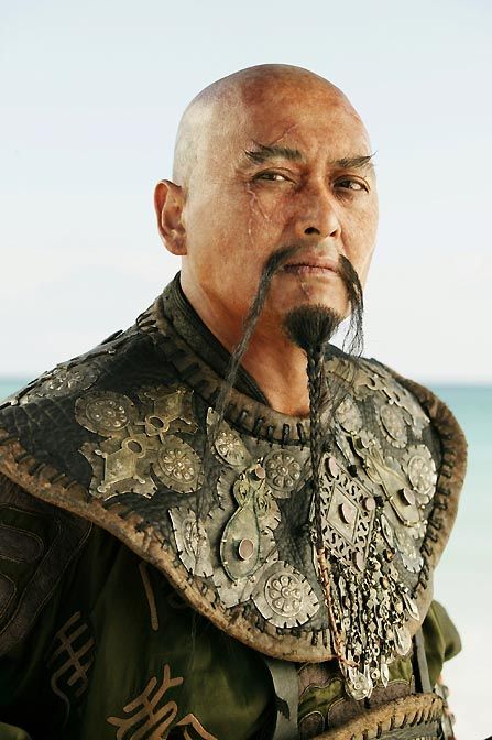 an image of a man in armor on the beach