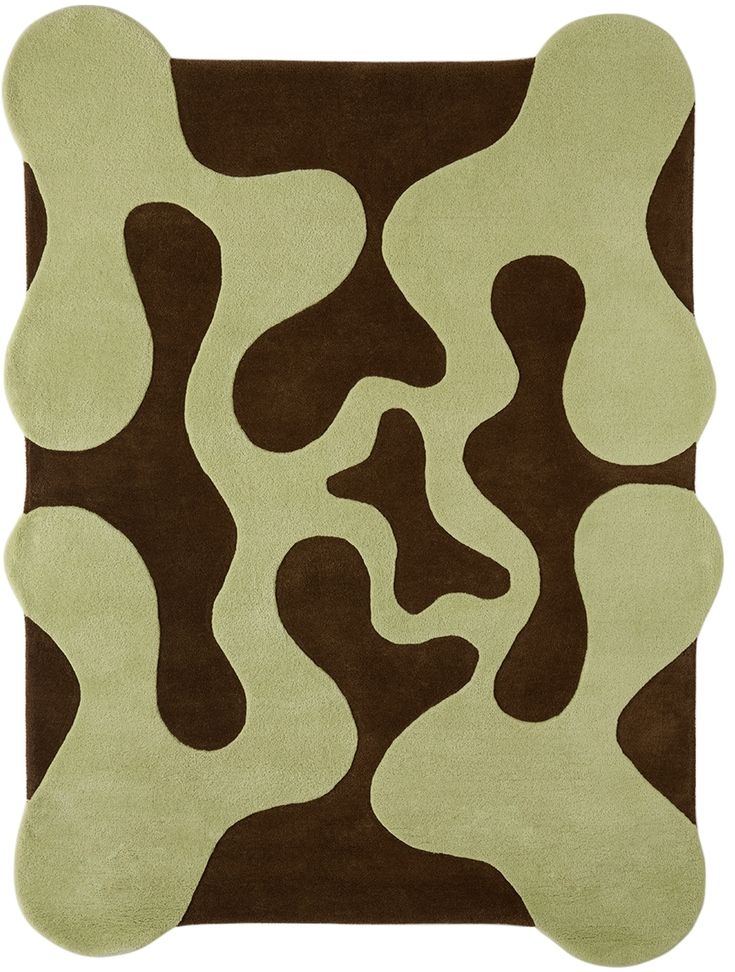 a brown and green rug with an abstract design