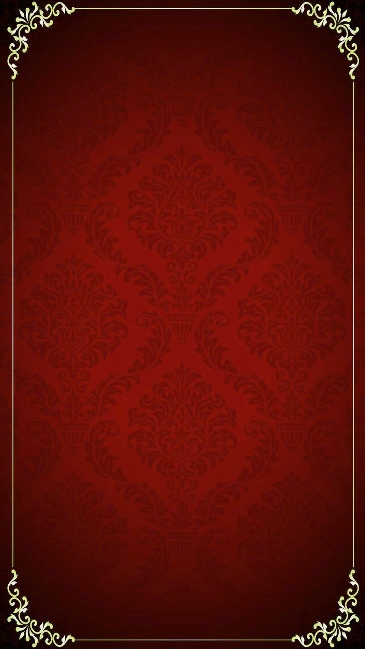 a red and gold background with an ornate frame on the bottom right hand corner,