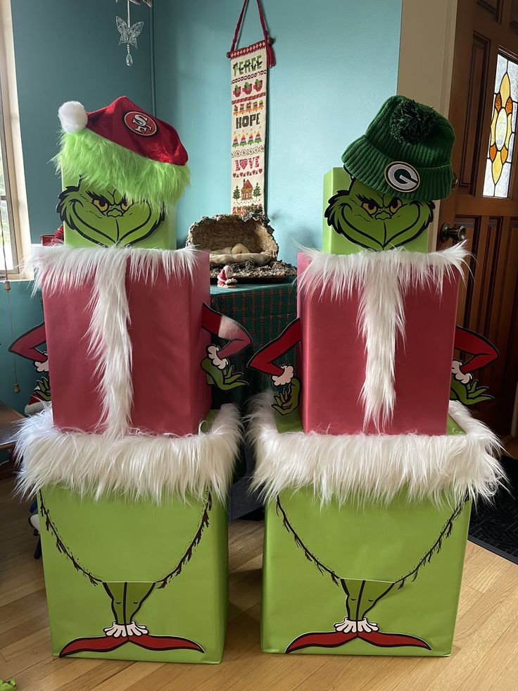 the grinch chairs are decorated with green and red