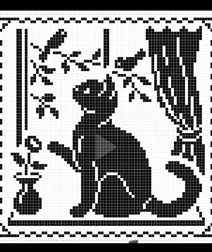 a black and white cross stitch pattern with a cat