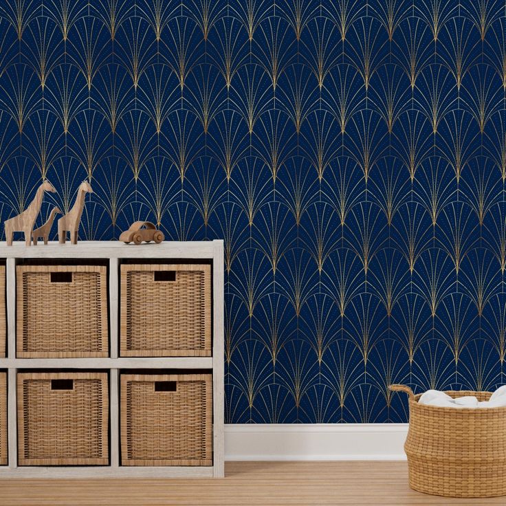 an art deco wallpaper design with blue and gold fan pattern in the background, next to four wicker baskets