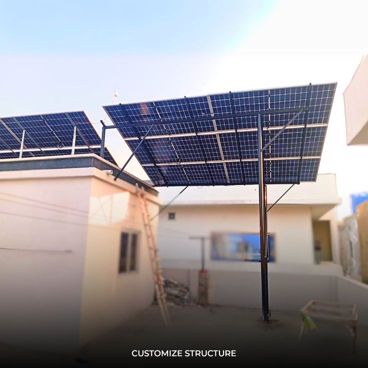 two solar panels on the roof of a house